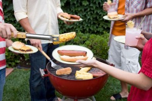 Friends having a BBQ (Getty Images/Ronnie Kaufman)