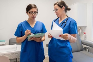 Female health care professionals interacting in a clinic (Getty Images/Michele Pevide)