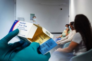 Paxlovid | Patients in a hospital waiting room (Photo illustration by Salon/Getty Images)