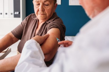 woman receiving vaccine