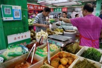 China's consumer prices stall, factory deflation persists