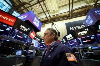 Nasdaq ends down on higher yields, chipmaker share declines