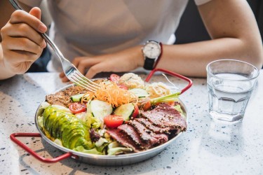 Person eating balanced meal