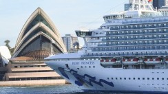 The Ruby Princess cruise ship departs the Overseas Passenger terminal in Circular Quay on March 19, 2020 in Sydney, Australia.