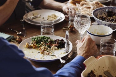 Man sitting at Thanksgiving table