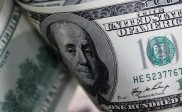 Dollar at one-month peak on easing rate-cut bets; pound jumps after inflation