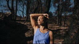 Pensive female in the forest