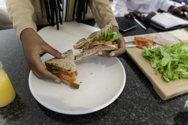 Woman holding a sandwich