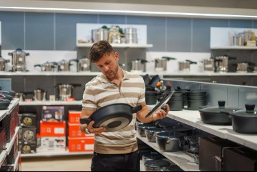 Man shopping for cookware