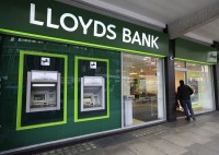 Lloyds profit jumps, sets aside 450 million pounds for motor finance review