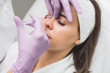 woman getting facial injections