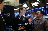 Wall St eyes muted open after rally on AI boost, inflation relief