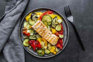 plate of food with fish and vegetables