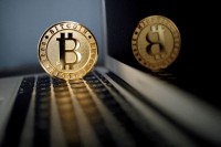 Marketmind: Risk rally on hold, bitcoin excepted